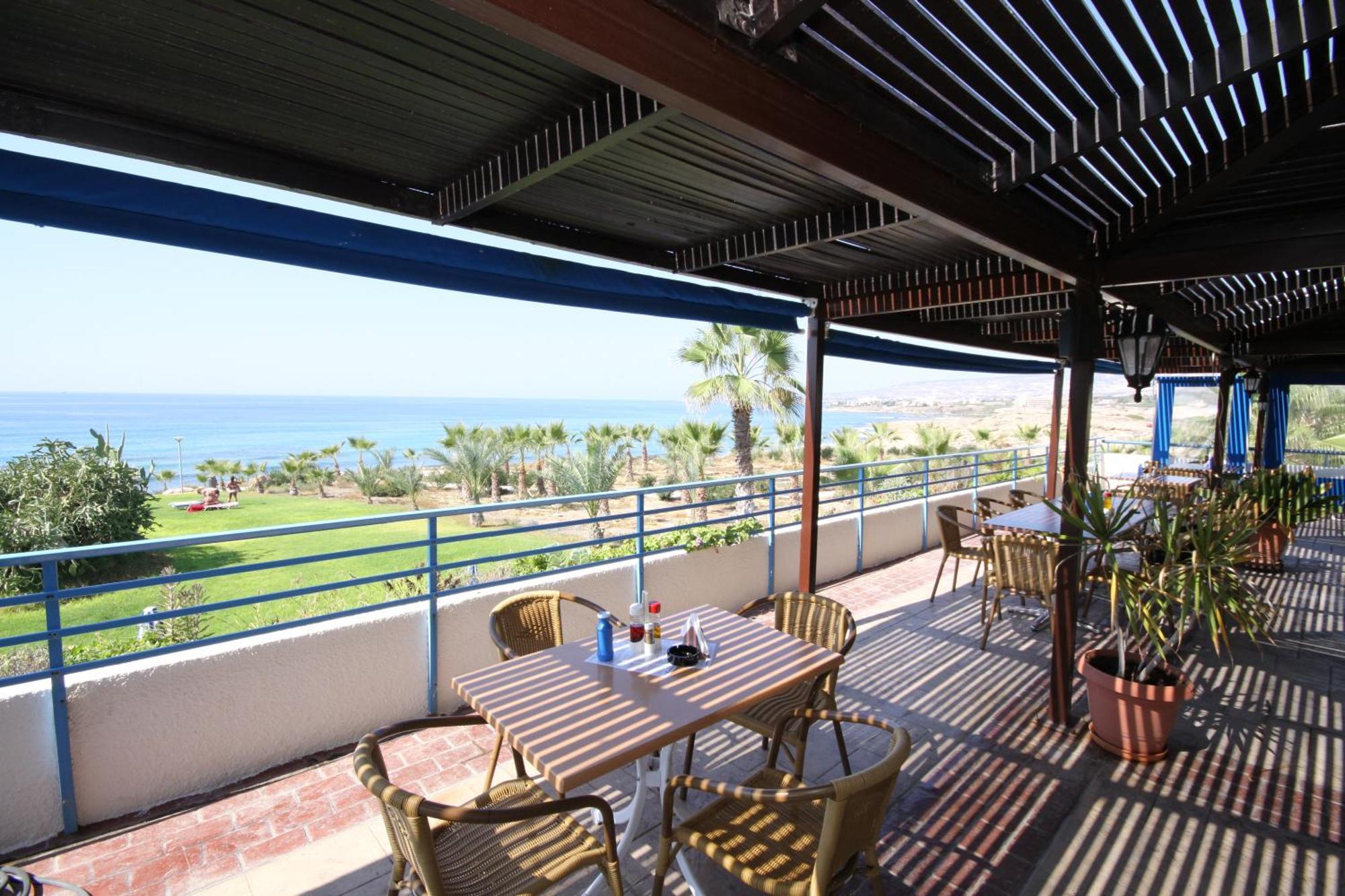 Helios Bay Hotel And Suites Klorakas Ресторан фото