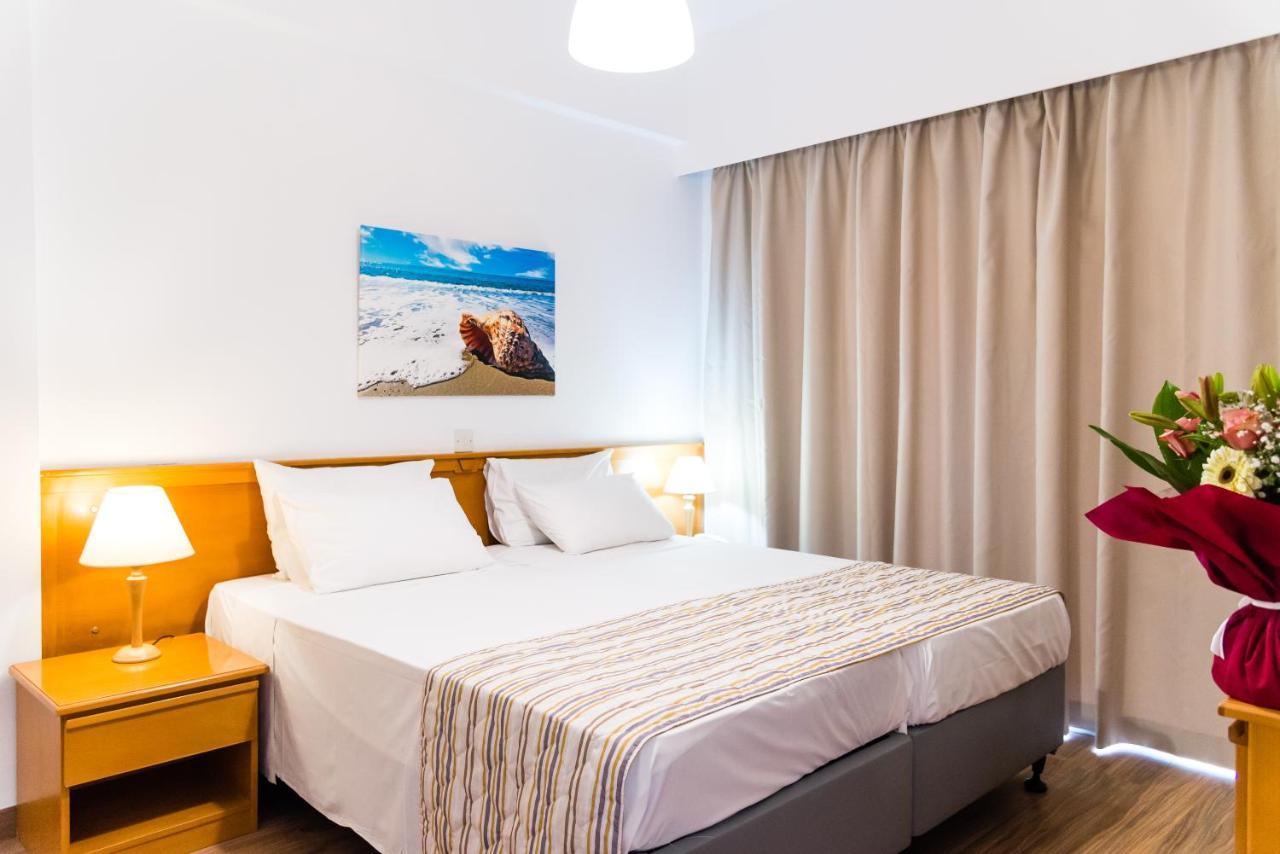 Helios Bay Hotel And Suites Klorakas Екстер'єр фото